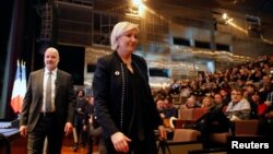 Marine Le Pen, National Front political party leader, attends a news conference, during the party's convention in Lille, France, March 10, 2018.