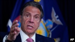 FILE - New York Gov. Andrew Cuomo speaks during a news conference, May 10, 2021 in New York. 