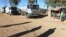 FILE: Police vehicles and water canons parked on the outskirts of the city following a job boycott started via social media platforms, in Harare, Wednesday, July,6, 2016. (AP Photo/Tsvangirayi Mukwazhi)