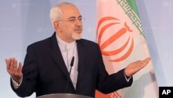 Iran's Foreign Minister Mohammad Javad Zarif, left, and his German counterpart, Sigmar Gabriel, not pictured, attend a news conference at the Foreign Affair's Office in Berlin, Germany, June 27, 2017.