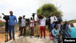 FILE - Somali journalists are seen in Mogadishu, July 25, 2019. 