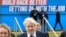 Britain's Prime Minister Boris Johnson walks through the Conservative Party annual conference venue, in Manchester, Britain, Oct. 3, 2021.