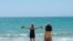 German tourists arrive at the beach of Palma de Mallorca, Spain, June 15, 2020.