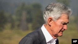 Federal Reserve Chair Jerome Powell walks outside of the Jackson Hole Economic Symposium at Jackson Lake Lodge in Grand Teton National Park near Moran, Wyoming, on Aug. 23, 2024.