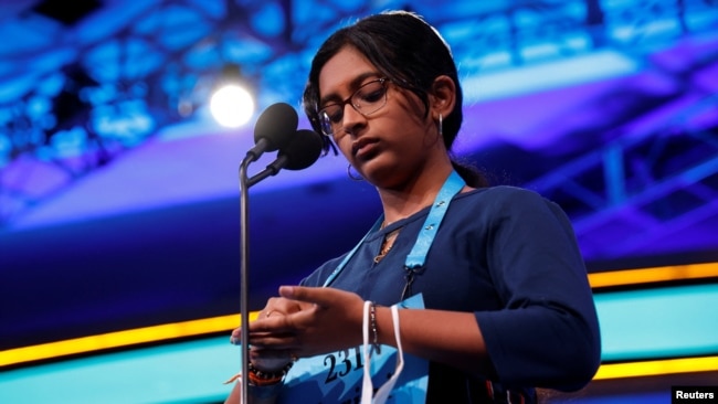 Harini Logan, 14, from San Antonio, Texas, participates in the final round on her way to winning the annual Scripps National Spelling Bee held at National Harbor in Oxon Hill, Maryland, U.S., June 2, 2022. (REUTERS/Jonathan Ernst)