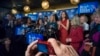 Rep. Carolyn Maloney, D-N.Y., center, speaks as a person takes a photograph during the "Last Hillary Clinton Rally" as part of the Ready For Hillary campaign in New York, April 11, 2015. 