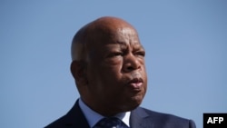 FILE - U.S. Rep. John Lewis, a Georgia Democrat, listens during a news conference Sept. 25, 2017, on Capitol Hill in Washington.