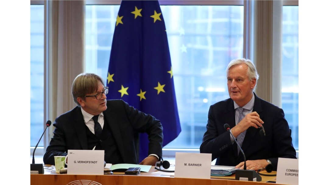 The European Union's Chief Brexit Negotiator Michel Barnier, right, and Guy Verhofstadt, the European Parliament’s Brexit steering group coordinator, attend a Brexit meeting at the European Parliament in Brussels, Belgium, Oct. 2, 2019.