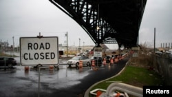 A street is closed due to work in the road in Jersey City, New Jersey, March 31, 2021. 