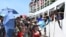 Voters board the already overcrowded Fair Glory ferry in Honiara, Solomon Islands, April 13, 2024, heading to Malaita Island to vote in a national election. The country in which China has gained most influence in the South Pacific goes to the polls on Wednesday.
