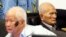 FILE - Khieu Samphan (l), former Khmer Rouge head of state, and Nuon Chea, Khmer Rouge's chief ideologist and No. 2 leader, sit in the court room before they made closing statements at the U.N.- backed war crimes tribunal in Phnom Penh, Oct. 31, 2013. 