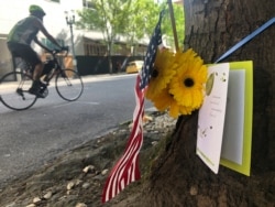 A small memorial to Portland, Oregon, fatal shooting victim Aaron J. Danielson, 39, of Portland is shown on Monday, Aug. 31, 2020, at the site where he was killed on Saturday, Aug. 29, 2020.
