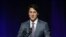 FILE - Canada's Prime Minister Justin Trudeau addresses a session at the second day of the National Governors Association meeting, July 14, 2017, in Providence, Rhode Island. 