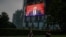 A screen at a department store shows Chinese President Xi Jinping during the opening session of the Chinese People's Political Consultative Conference (CPPCC) at the Great Hall of the People in Beijing, China, May 21, 2020. 