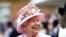 FILE - Britain's Queen Elizabeth arrives for a Royal Garden Party at Buckingham Palace in London, May 29, 2019.