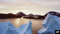 Icebergs float near the settlement of Kulusuk in southeastern Greenland.