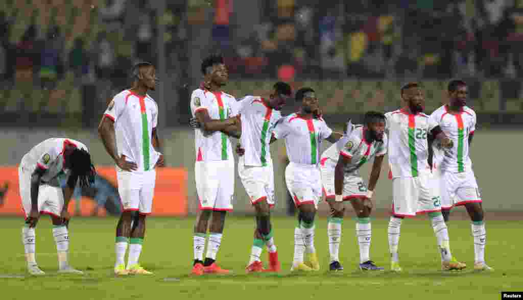 Burkina Faso players react during the penalty shoot-out against Cameroon, Feb. 5, 2022.