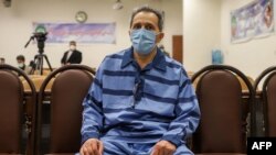 FILE - Jamshid Sharmahd attends the first hearing of his trial in Tehran on Feb. 6, 2022. (Mizan News Agency/AFP)