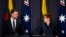 Australian Foreign Affairs Minister Marise Payne, right, and Lithuania's counterpart Gabrielius Landsbergis hold a press conference at Parliament House in Canberra, Australia, Wednesday, Feb. 9, 2022.