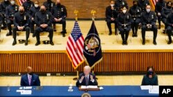 President Joe Biden speaks at an event with New York City to discuss gun violence strategies, at police headquarters, in New York, Feb. 3, 2022. 