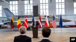 FILE - Lithuania's Minister of National Defense Arvydas Anusauskas speaks during a press conference during the welcome ceremony for the reinforcement of the NATO Air Policing Mission at the Siauliai military air force base, in Lithuania, Jan. 28, 2022. 