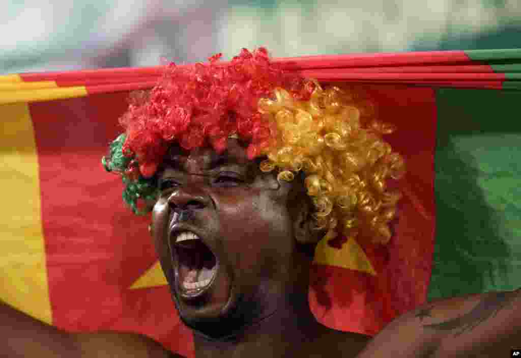 A Cameroon supporter cheers, Cameroon, Feb. 5, 2022