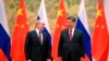 El presidente chino, Xi Jinping, a la derecha, y el presidente ruso, Vladimir Putin. (Alexei Druzhinin, Sputnik, foto del Kremlin vía AP)