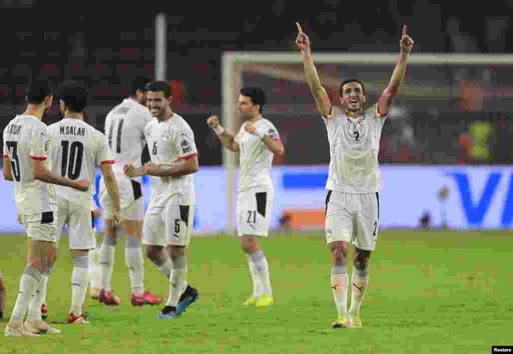 Egypt&#39;s Mohamed Abdel-Moneim celebrates during the penalty shootout, Feb. 3, 2022.