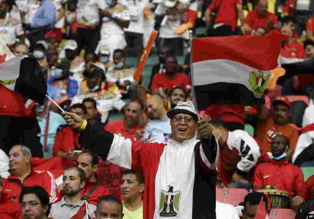 An Egyptian fan cheers in the stands, Feb. 6, 2022.