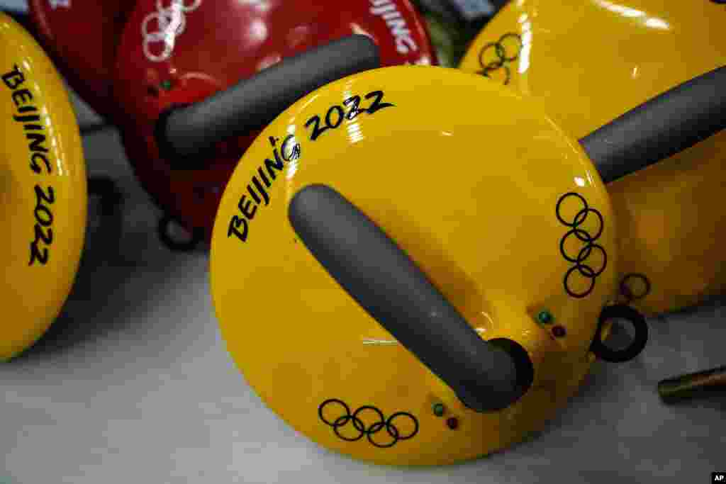 The Olympic rings are seen on a curling stone ahead of the Beijing Winter Olympics Feb. 2, 2022.