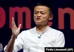 FILE - Chairman of Alibaba Group Jack Ma speaks during a seminar in Bali, Indonesia on Friday, Oct. 12, 2018.