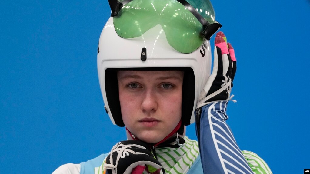 Elsa Desmond, of Ireland, prepares to start for the luge women's singles run 1 at the 2022 Winter Olympics, Monday, Feb. 7, 2022, in the Yanqing district of Beijing.(AP Photo/Mark Schiefelbein)