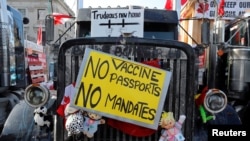A truck sits near Parliament Hill as truckers and their supporters continue to protest coronavirus disease (COVID-19) vaccine mandates, in Ottawa, Ontario, Canada, Feb. 7, 2022.