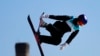 Eileen Gu, of China, competes during the women's freestyle skiing big air finals of the 2022 Winter Olympics, Feb. 8, 2022, in Beijing. 