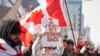 Natpis "Želim da mi vratite slobodu" na protestu kamiondžija u glavnom gradu Kanade (Foto: AFP/Geoff Robins)