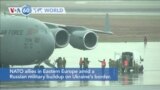 VOA60 World - U.S. troops arrive in Poland