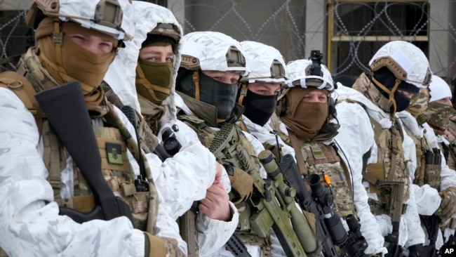 Local residents attend an all-Ukrainian training campaign "Don't panic! Get ready!" close to Kyiv, Ukraine, Feb. 6, 2022.