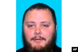FILE - This undated file photo provided by the Texas Department of Public Safety shows Devin Patrick Kelley.