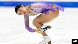 FILE- Karen Chen competes in the women's free skate program during the US Figure Skating Championships Jan. 7, 2022, in Nashville, Tenn.