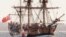 FILE - A replica of the ship HMS Endeavour is at anchor in Botany Bay, Sydney, April 17, 2005.