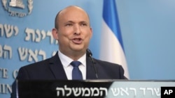 FILE - Israeli Prime Minister Naftali Bennett speaks during a news conference at the Prime Minister's Office in Jerusalem, Jan. 2, 2022. 