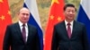ប្រធានាធិបតី​រុស្ស៊ីលោក Vladimir Putin និង​ប្រធានាធិបតី​ចិន​លោក Xi Jinping ថតរូប​ជុំគ្នា​នៅមុន​កិច្ចពិភាក្សា​ក្នុង​ទីក្រុង​ប៉េកាំង ប្រទេស​ចិន កាលពី​ថ្ងៃទី៤ ខែកុម្ភៈ ឆ្នាំ​២០២២។