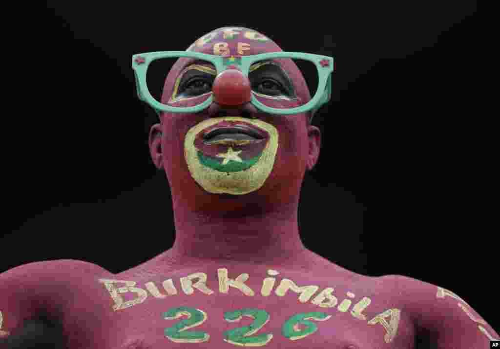 A Burkina Faso soccer fan looks on before the match against Cameroon, Feb. 5, 2022.