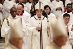 Pope Francis leaves at the end of an Epiphany Mass in St. Peter's Basilica at the Vatican, Jan. 6, 2020.