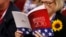 A delegate studies a copy of the Republican platform document that reflect the policies of the Republican Party that will be voted on at the RNC, at the Republican National Convention in Cleveland, Ohio, July 18, 2016. 