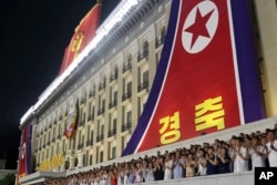 FILE - North Koreans celebrate the country's 76th founding anniversary at Kim Il Sung Square in Pyongyang, North Korea, Sept. 8, 2024.