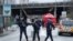 French police secure an area in Villejuif near Paris, France, after police shot dead a man who tried to stab several people in a public park, Jan. 3, 2020.
