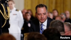 FILE - White House Chief of Staff Reince Priebus takes his seat during a ceremony at the White House in Washington, July 27, 2017.