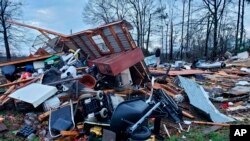 This photo provided by Bossier Parish Sheriff's Office shows damage from Friday nights severe weather, including the home of an elderly in Bossier Parish, La., on Saturday, Jan. 11, 2020. 