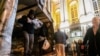 People unload bags of ballots from a truck at the Timis county Electoral Bureau in Timisoara, Romania, on Nov. 29, 2024. 